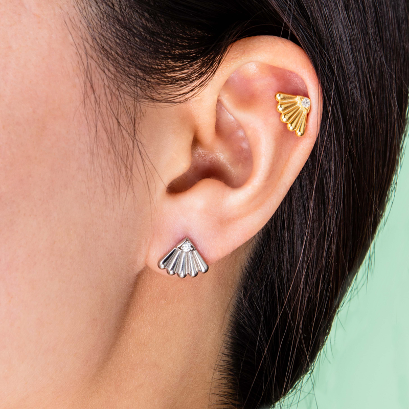 Photo of Anadara diamond stud earrings on ear