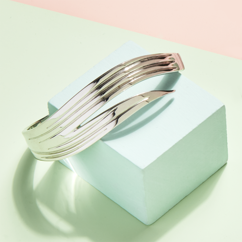 Photo of Dorado bangle on green and pink background