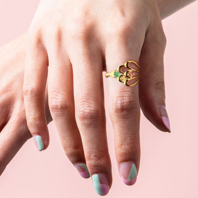 Photo of Lorelei yellow gold tutti frutti ring on hand